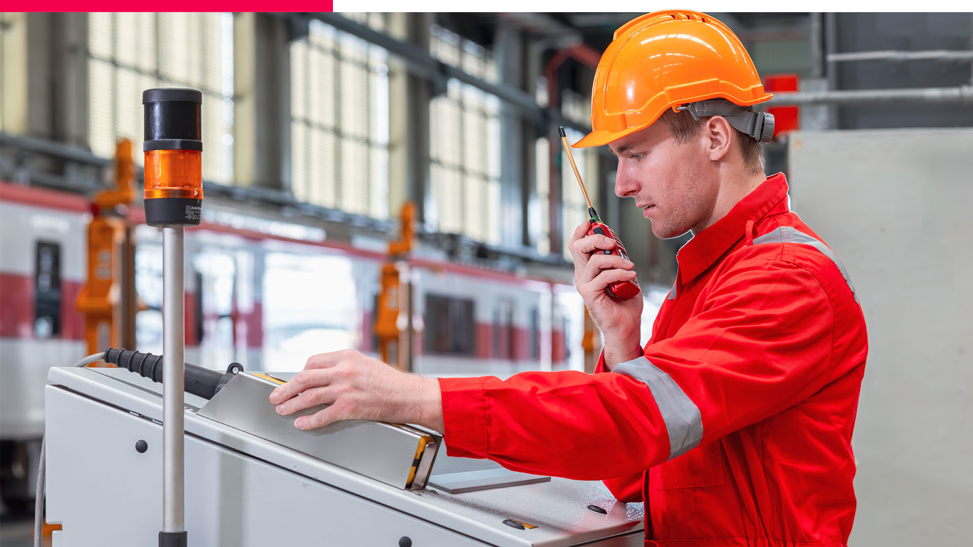 Railway engineer at maintenance station, symbolizing smart rail monitoring and control